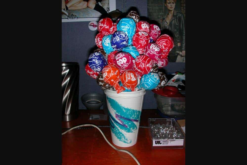 Tootsie Roll Pops in a cup