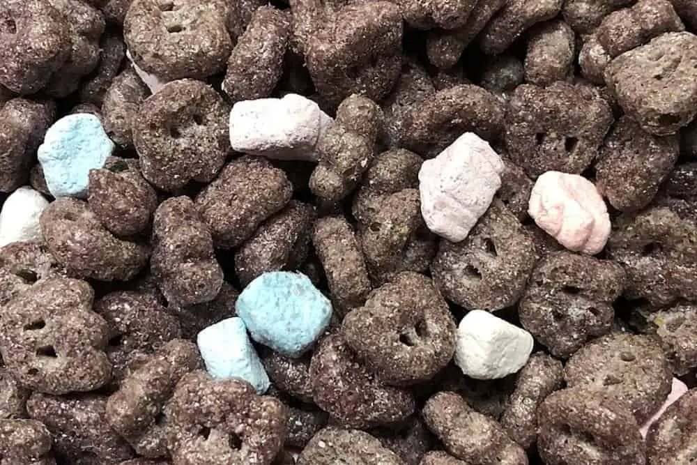 A close-up shot of Boo Berry Cereal in milk